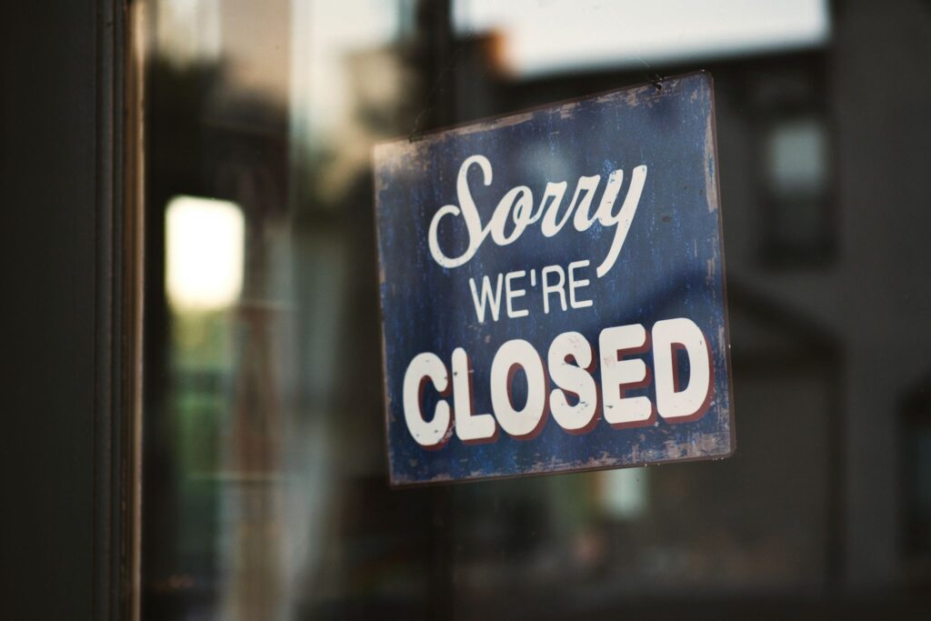 Sorry, we're closed sign illustrating an interrupted advertising funnel